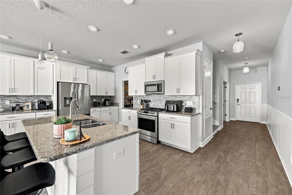 7594 LAKE HANCOCK BOULEVARD — photo 9 of 58