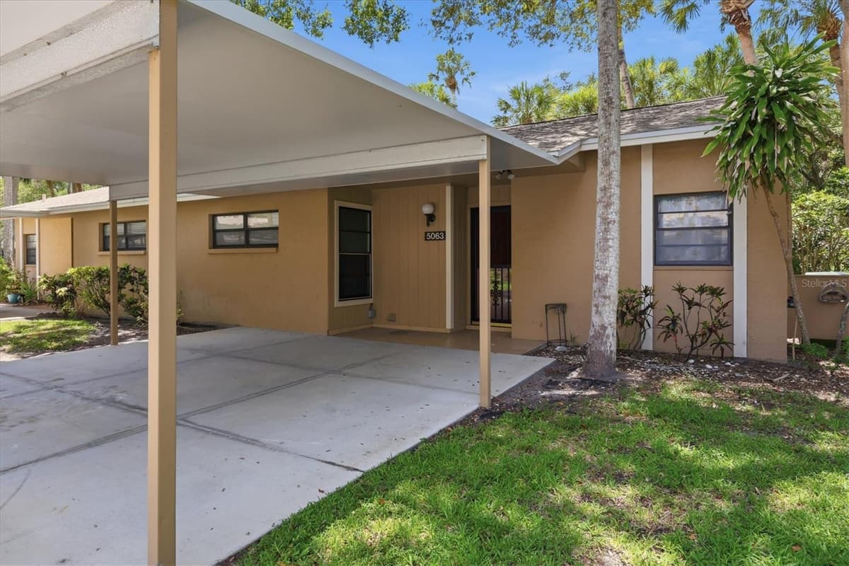 5063 VILLAGE GARDENS DRIVE — photo 4 of 40
