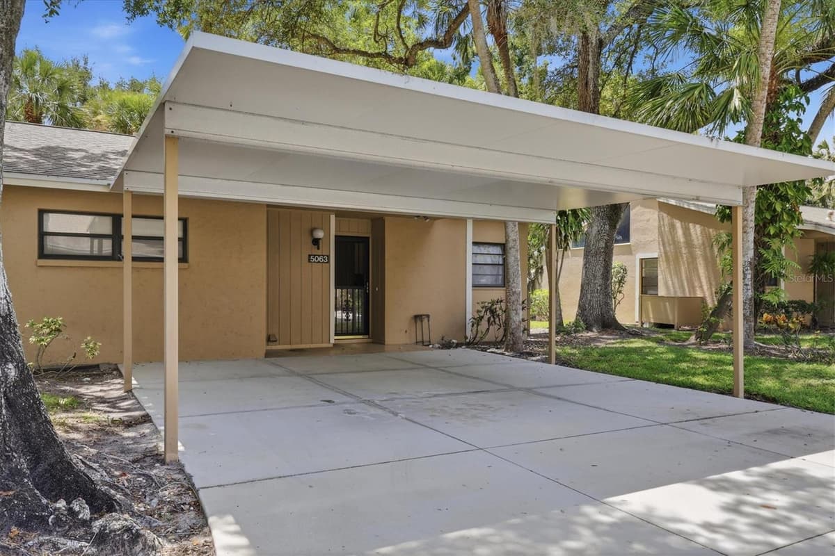5063 VILLAGE GARDENS DRIVE — photo 3 of 40