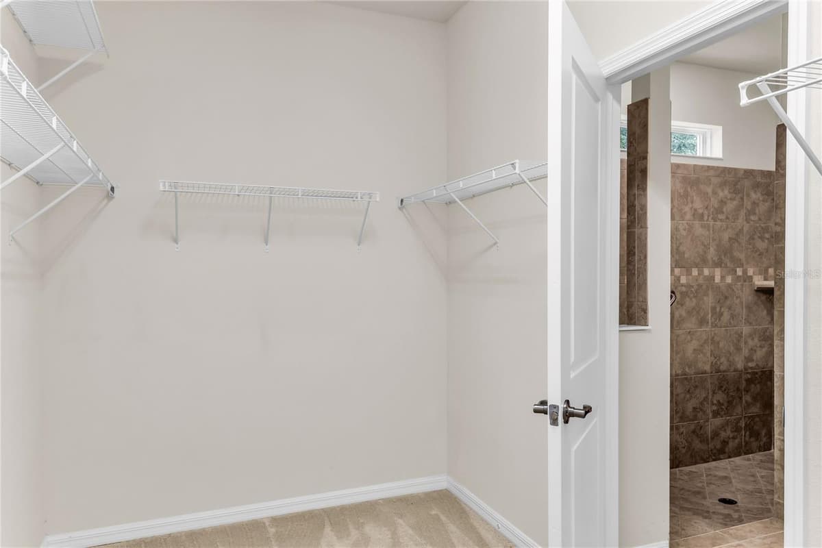 7052 ENCHANTED LAKE DRIVE — photo 26 of 66