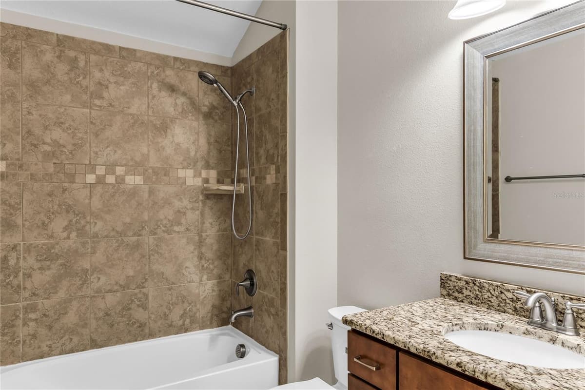 7052 ENCHANTED LAKE DRIVE — photo 34 of 66
