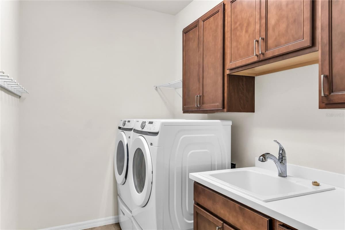 7052 ENCHANTED LAKE DRIVE — photo 45 of 66