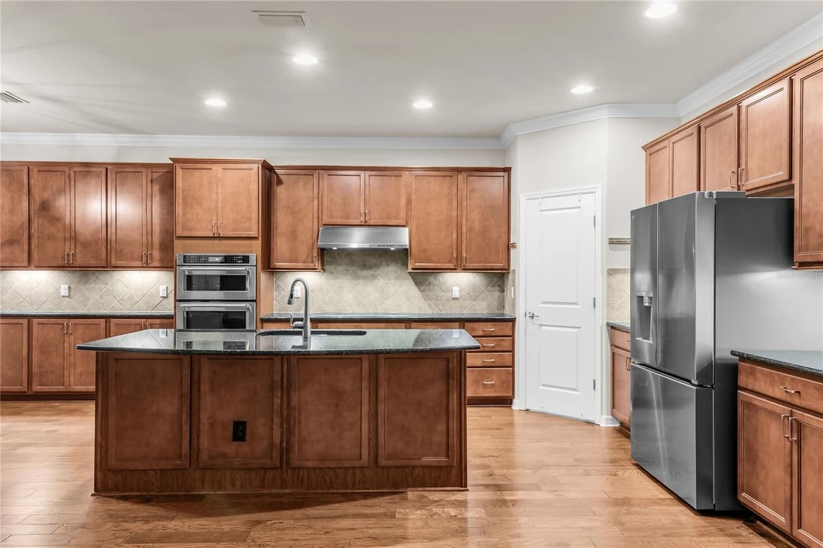 7052 ENCHANTED LAKE DRIVE — photo 8 of 66