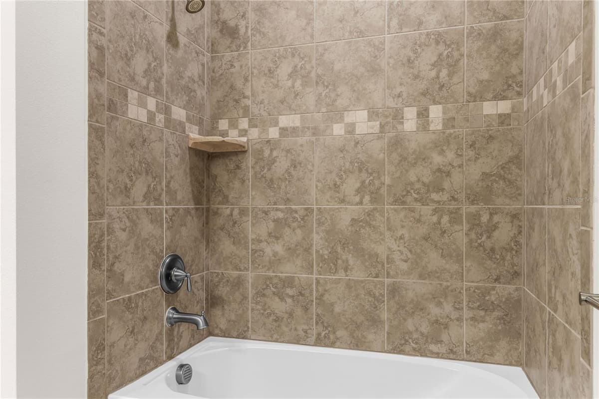 7052 ENCHANTED LAKE DRIVE — photo 44 of 66