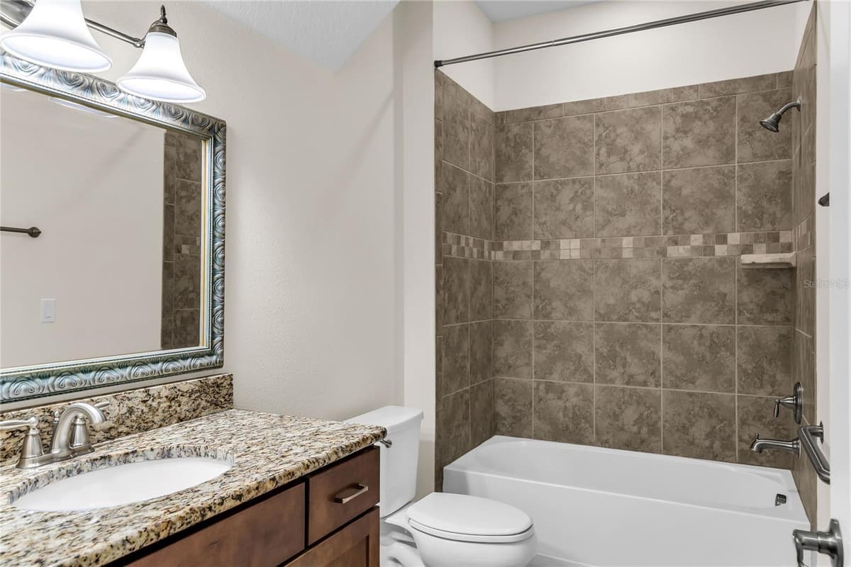 7052 ENCHANTED LAKE DRIVE — photo 40 of 66