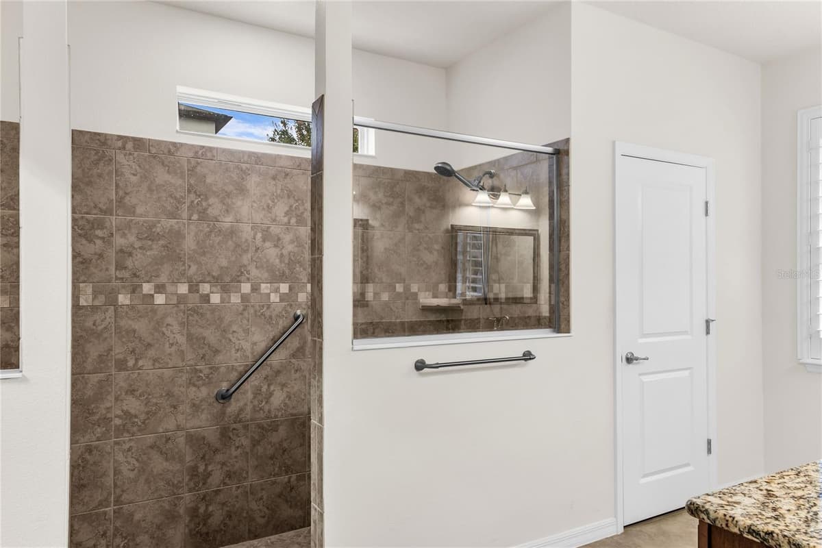 7052 ENCHANTED LAKE DRIVE — photo 24 of 66