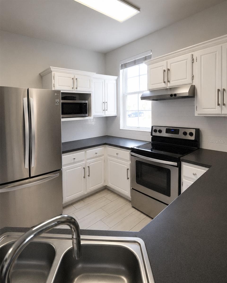 3213 GREENWICH VILLAGE BOULEVARD — photo 6 of 14