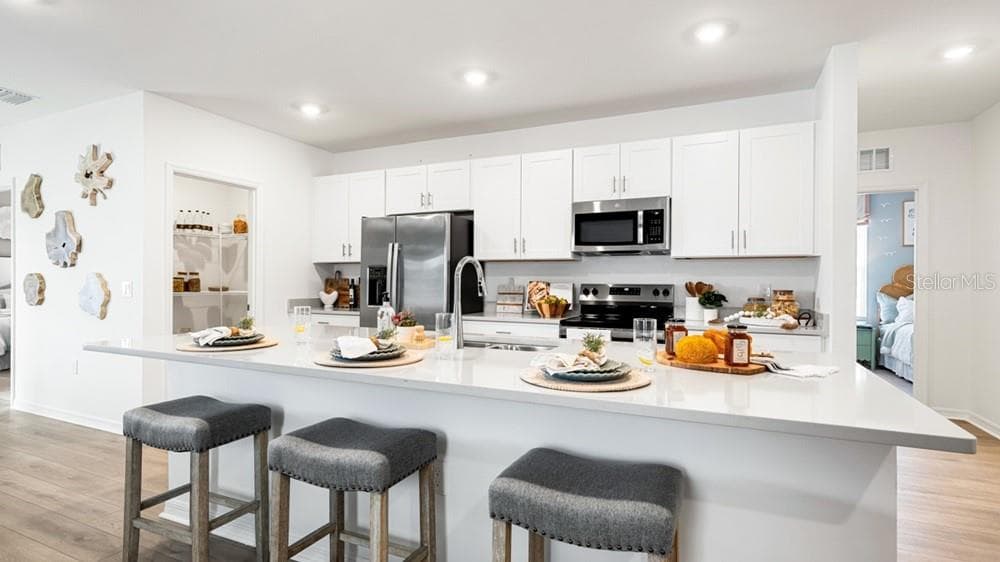 13681 TROPICAL BREEZE WAY — photo 4 of 27