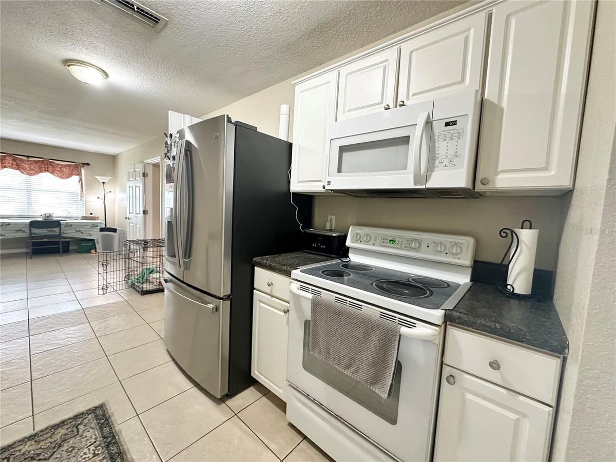 7507 CORAL VINE LANE — photo 6 of 28