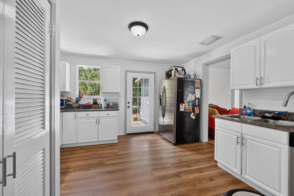 6020 FLORA VISTA AVENUE — photo 10 of 61