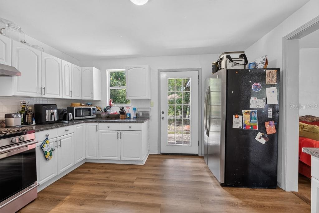 6020 FLORA VISTA AVENUE — photo 11 of 61