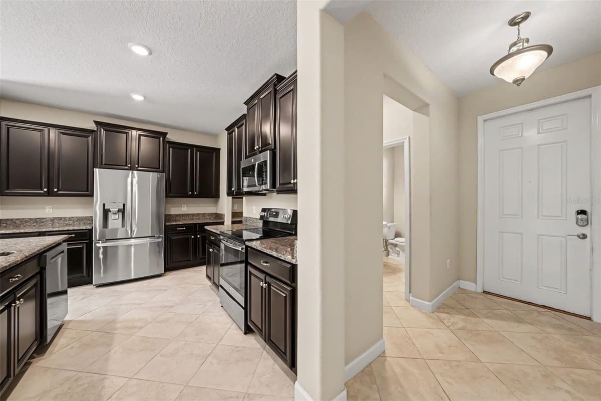 10032 SAGE CREEK DRIVE — photo 5 of 56