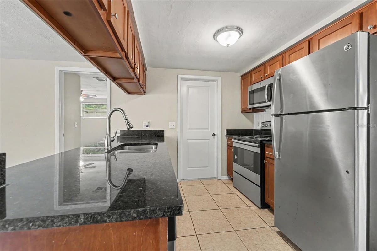 6177 MAPLEWOOD DRIVE — photo 5 of 15