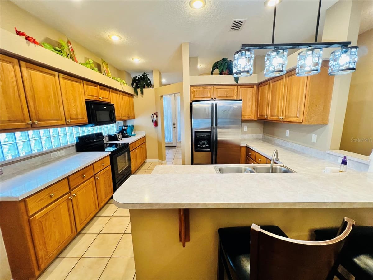 2918 SUNSET VISTA BOULEVARD — photo 3 of 34