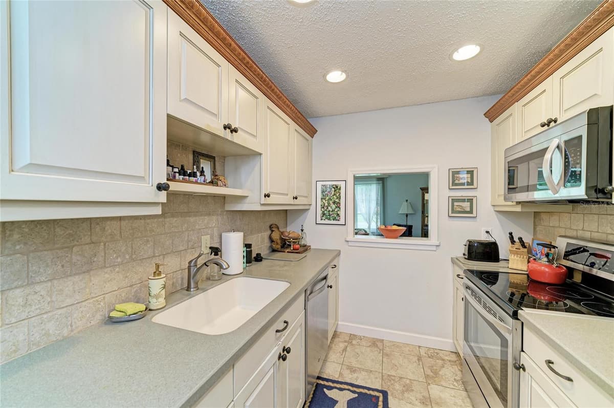 4723 PALM AIRE CIRCLE — photo 16 of 65