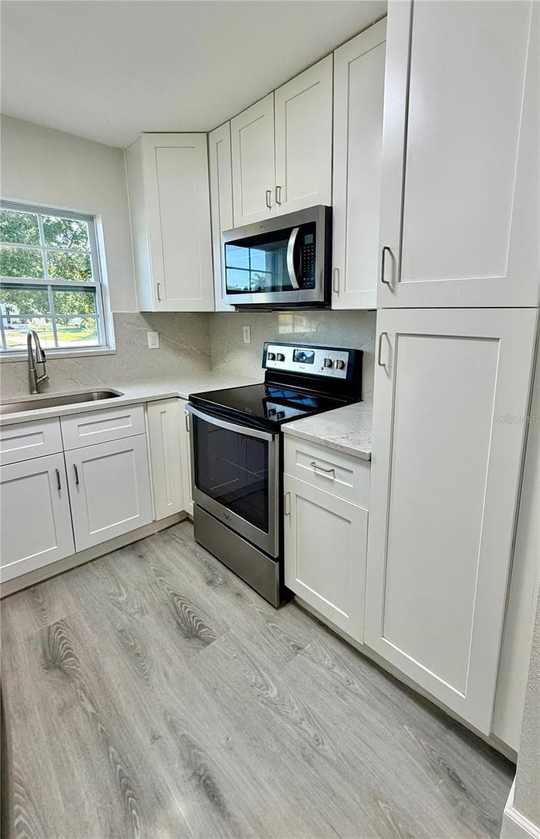 706 ROMANO AVENUE — photo 5 of 24