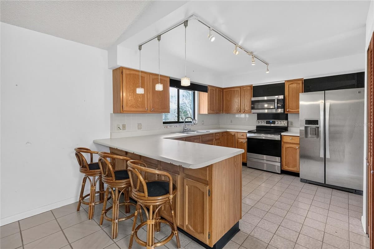 4840 LAKE CECILE DRIVE — photo 15 of 44