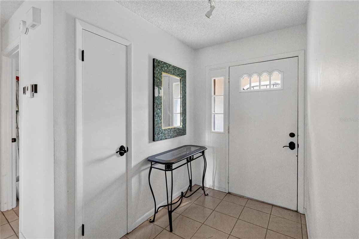 4840 LAKE CECILE DRIVE — photo 4 of 44