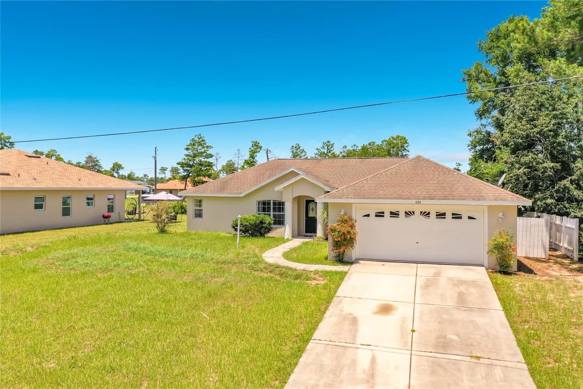 626 MARION OAKS LANE — photo 55 of 59