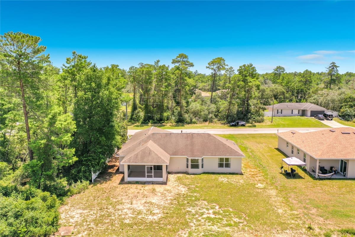 626 MARION OAKS LANE — photo 56 of 59