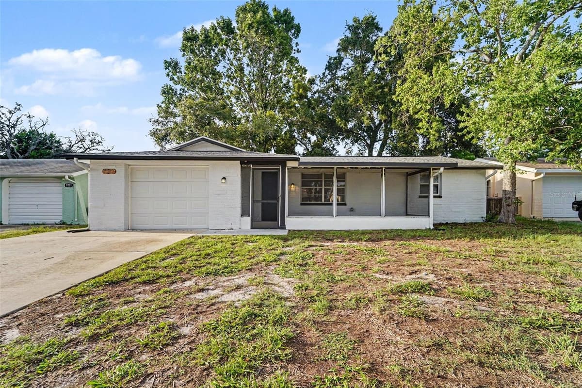 7207 SANDALWOOD DRIVE — photo 1 of 15
