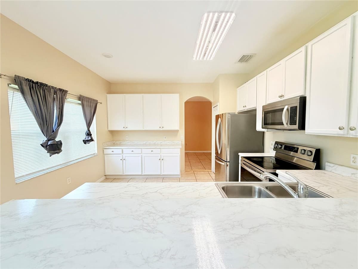 4208 LUGANO COURT — photo 5 of 34