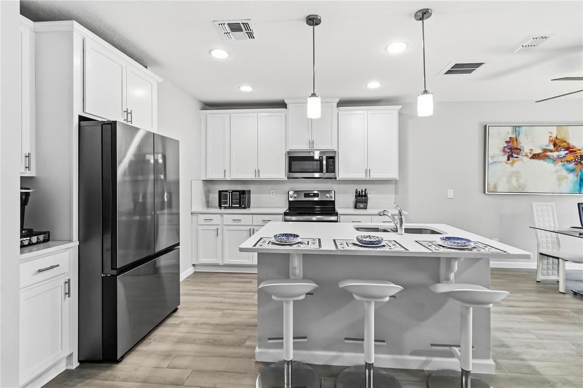 385 CAPE HONEYSUCKLE PLACE — photo 10 of 52