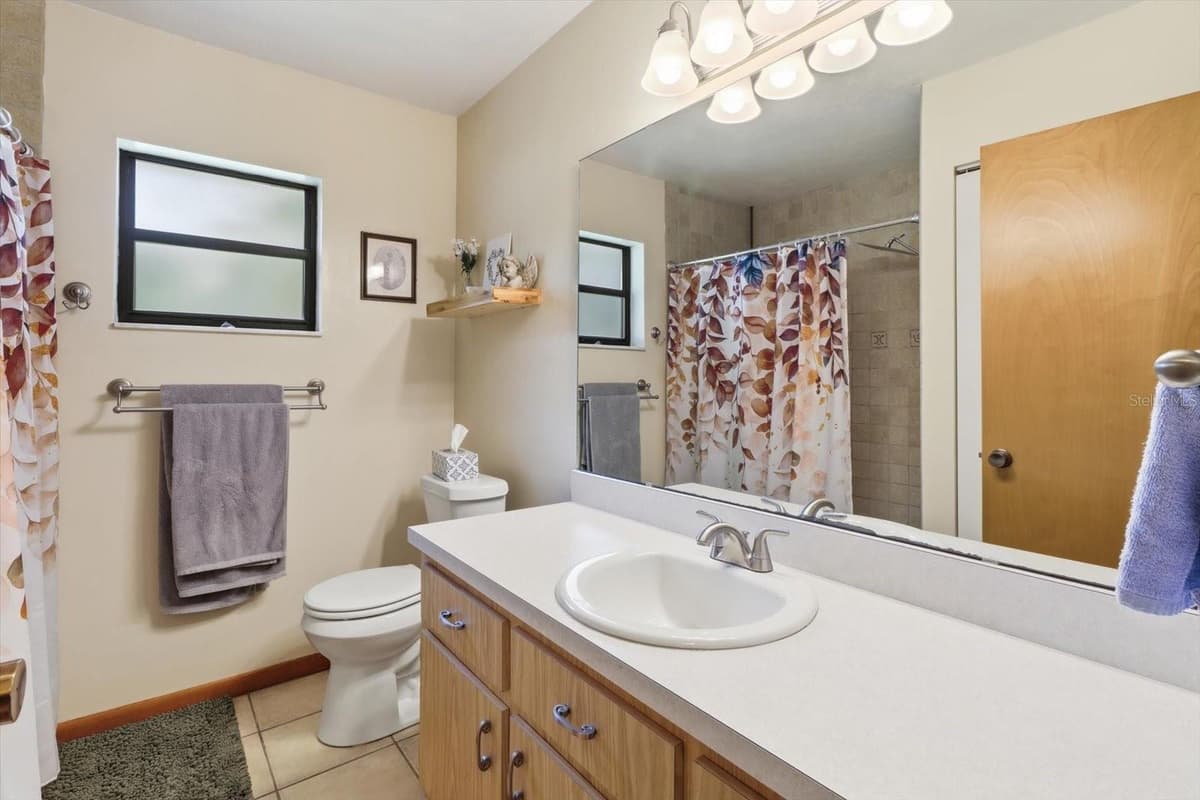 9188 COMMODORE DRIVE — photo 12 of 42