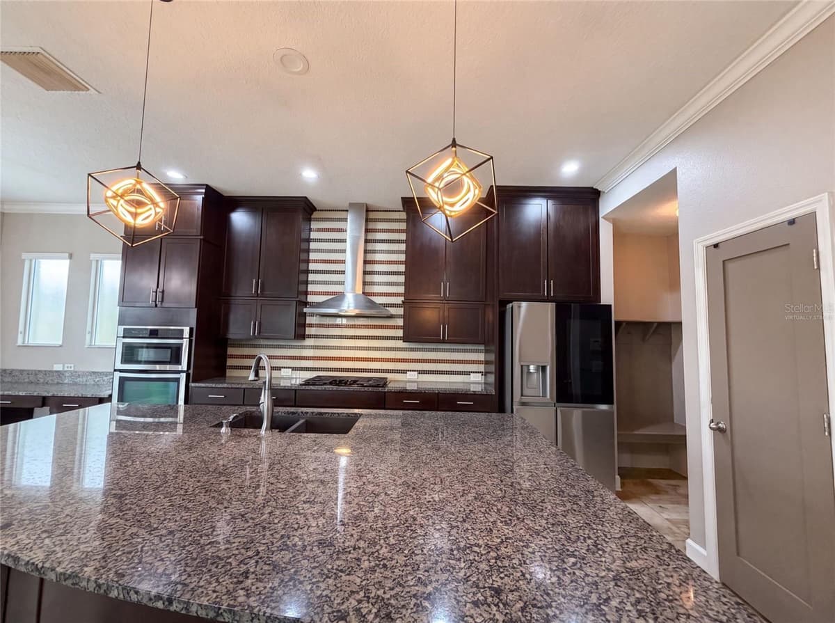 7304 MILESTONE DRIVE — photo 2 of 27