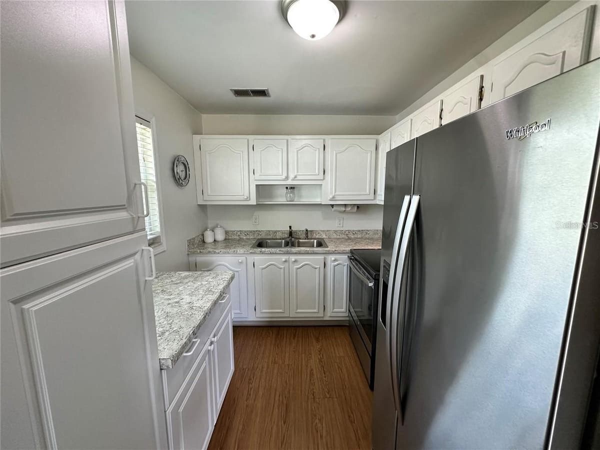 11725 BOYNTON LANE — photo 3 of 36