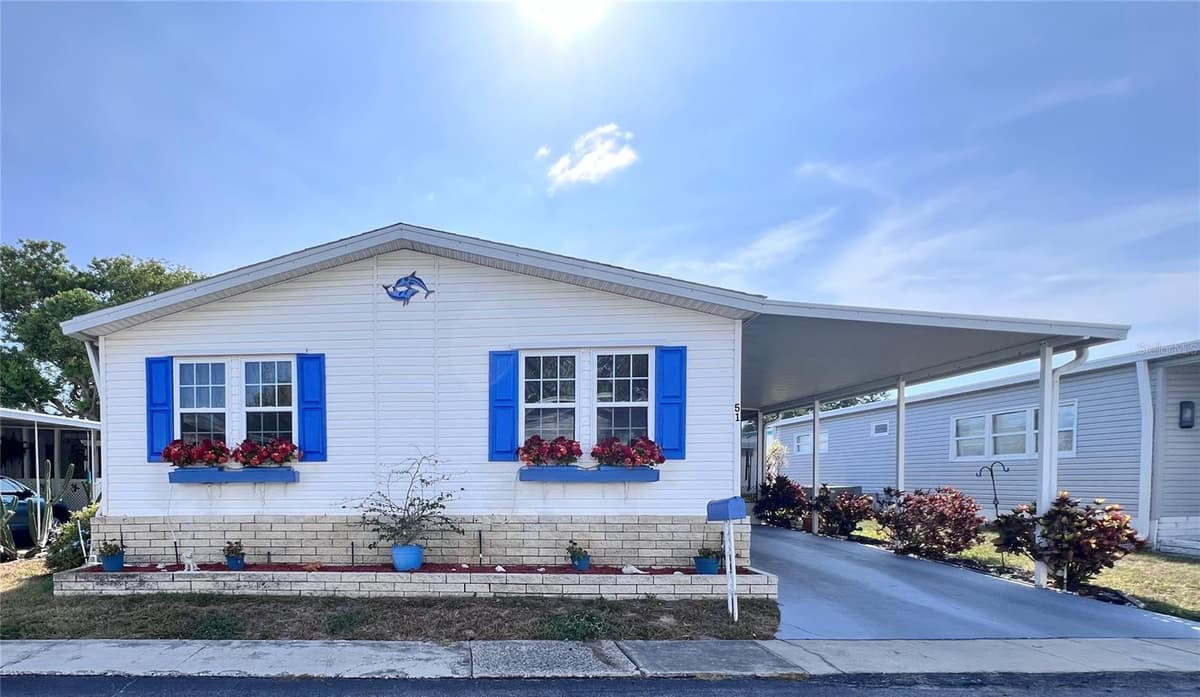 51 PINDO PALM STREET — photo 1 of 44