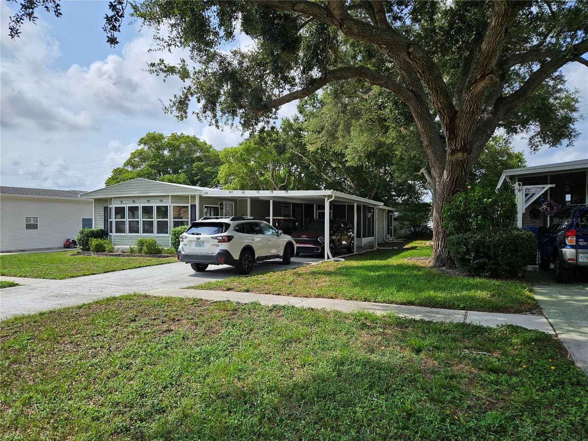 217 LAKE TARPON DRIVE — photo 2 of 23