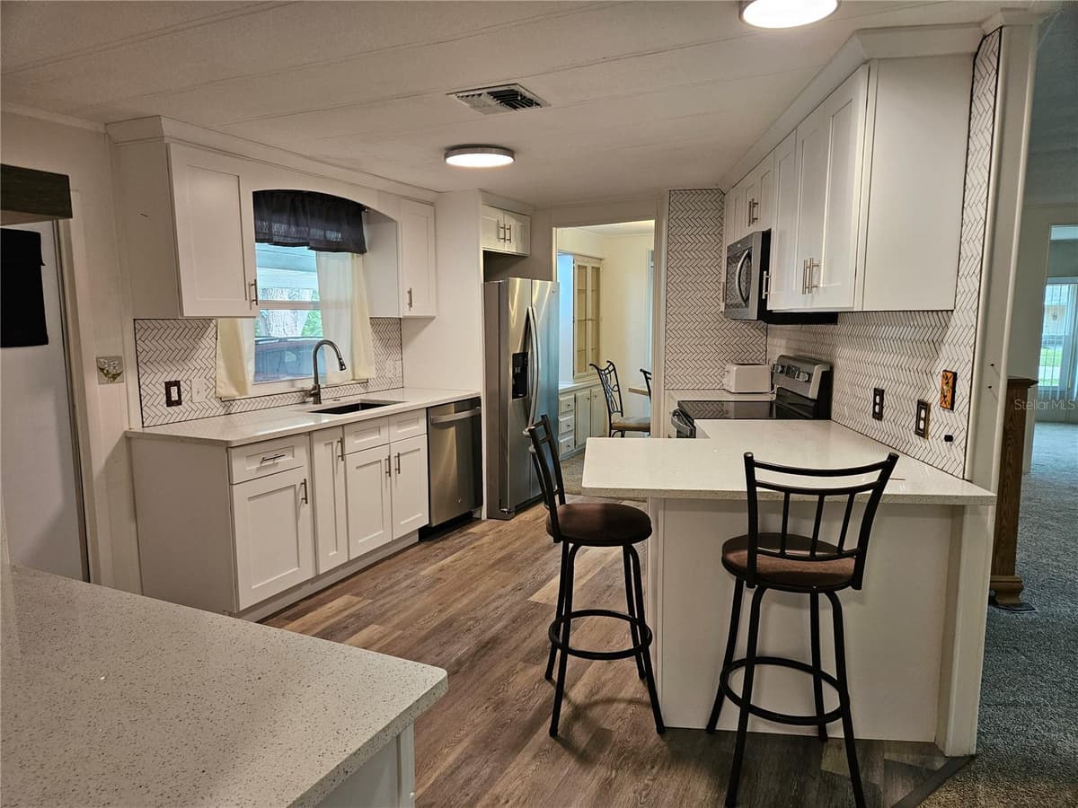 217 LAKE TARPON DRIVE — photo 5 of 23