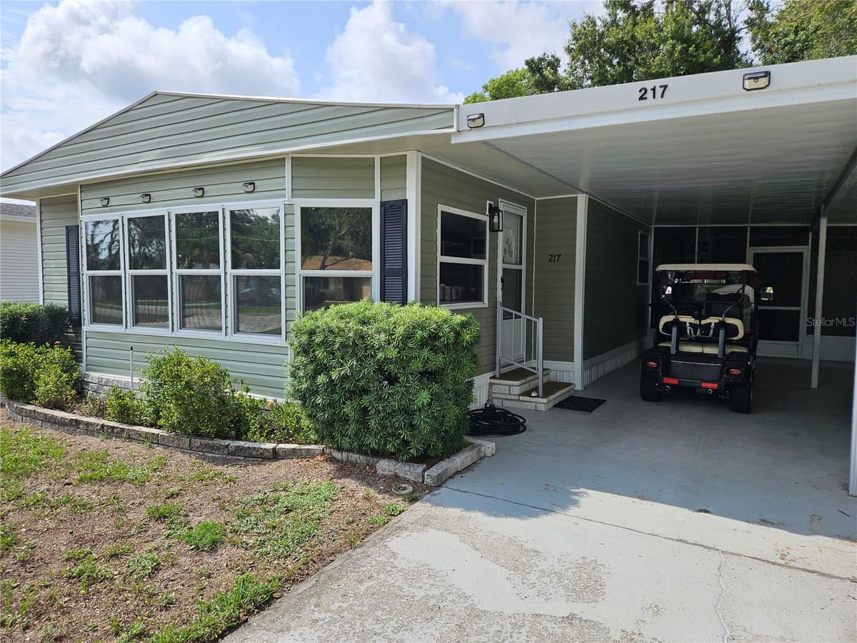217 LAKE TARPON DRIVE — photo 1 of 23