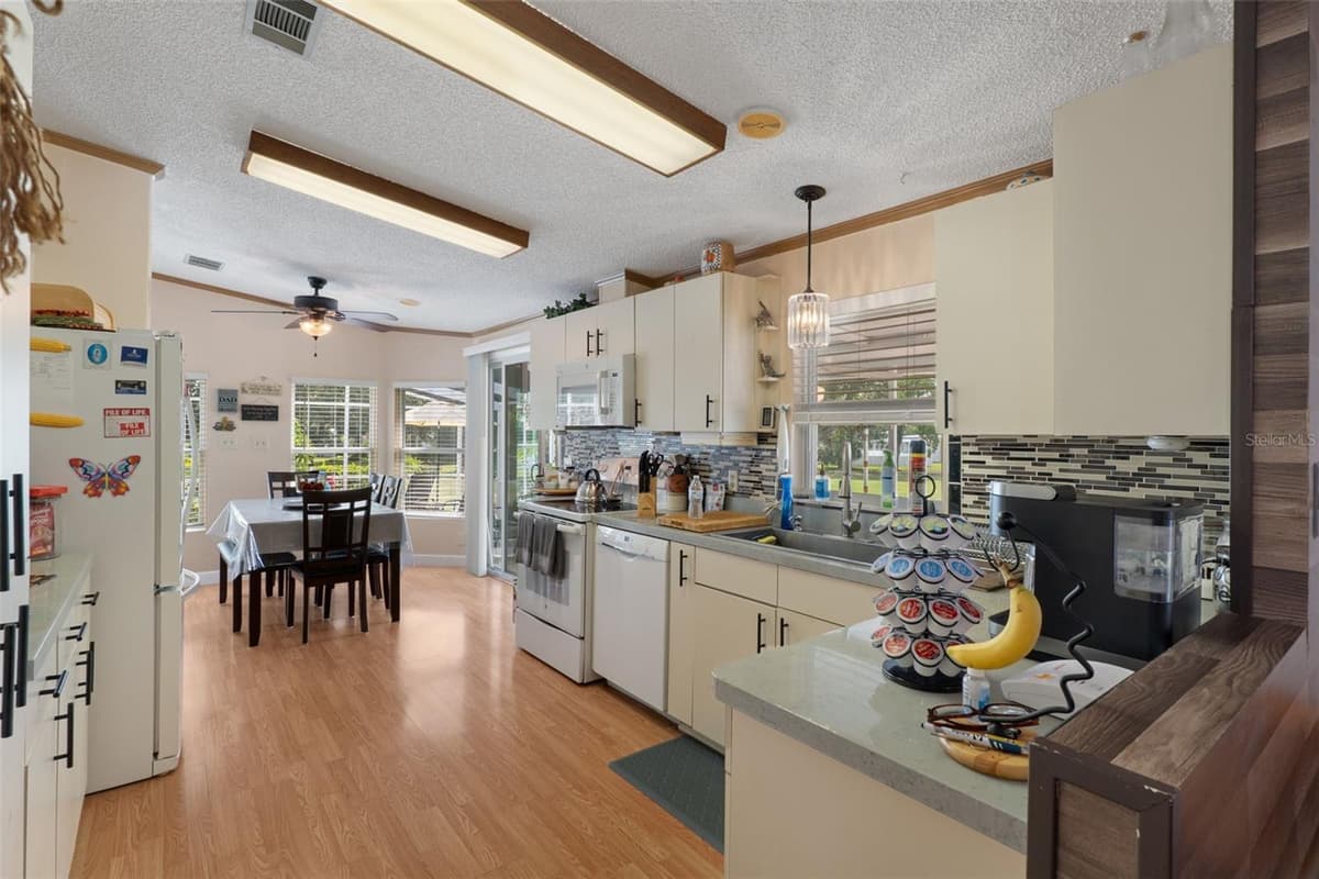 7436 NIELSON AVENUE — photo 6 of 54