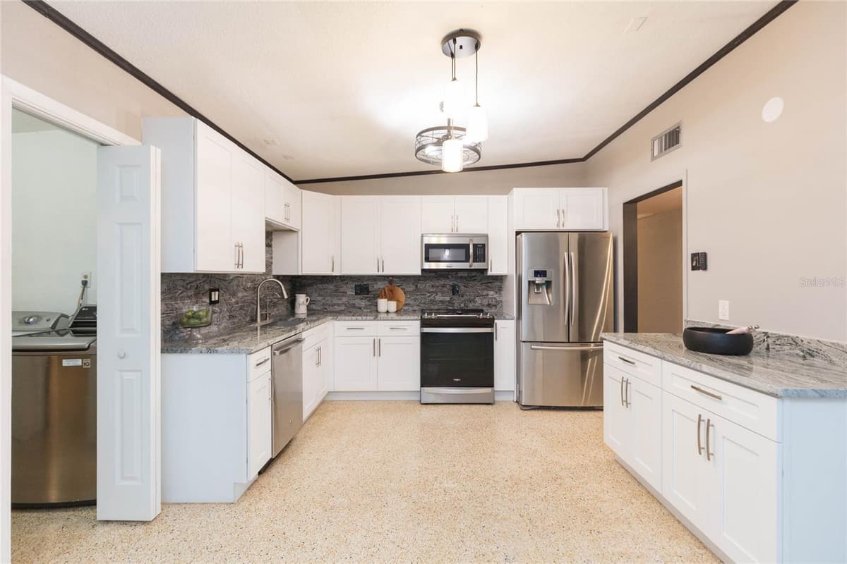 8813 FLAME VINE AVENUE — photo 6 of 42
