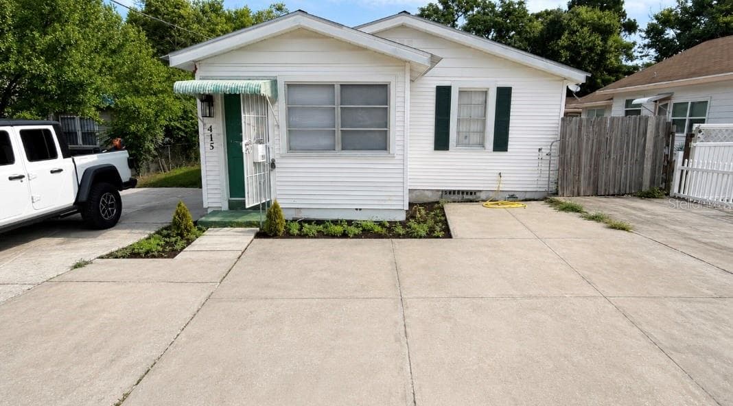 415 AVENUE E — photo 1 of 11
