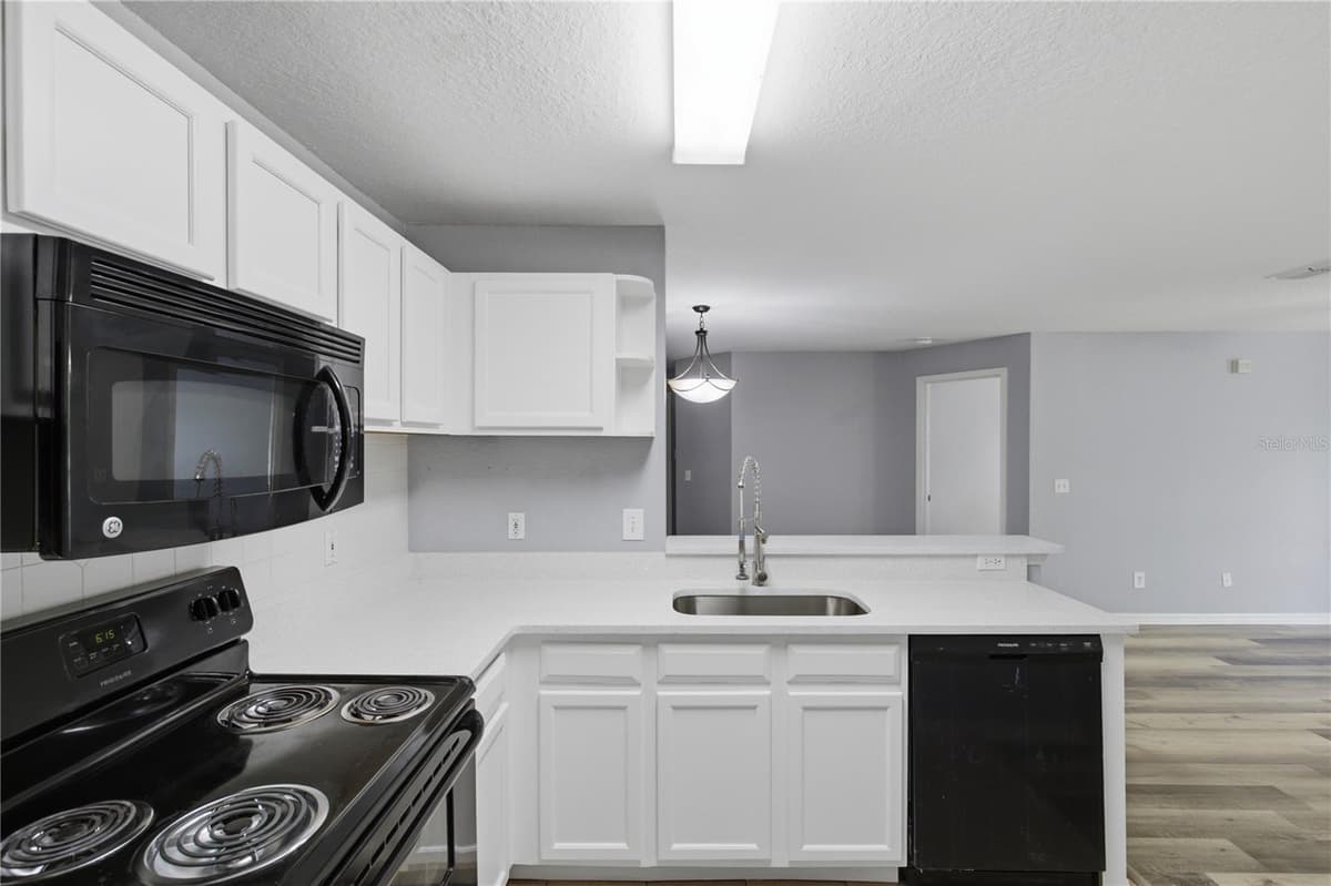 7605 PISSARRO DRIVE — photo 6 of 10