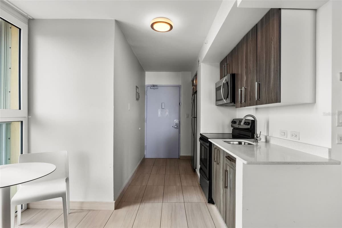 6165 ISLA VERDE AVE. — photo 10 of 18