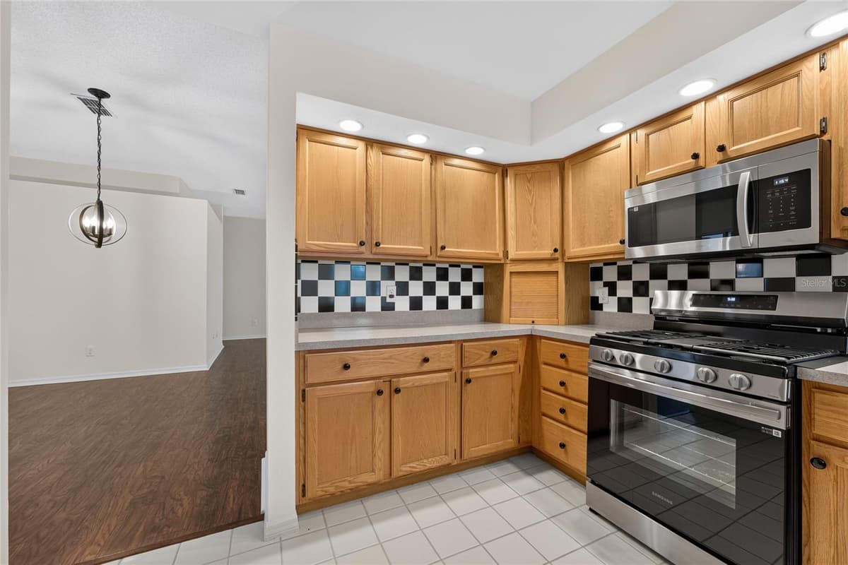11206 PURPLE PLUM COURT — photo 5 of 47
