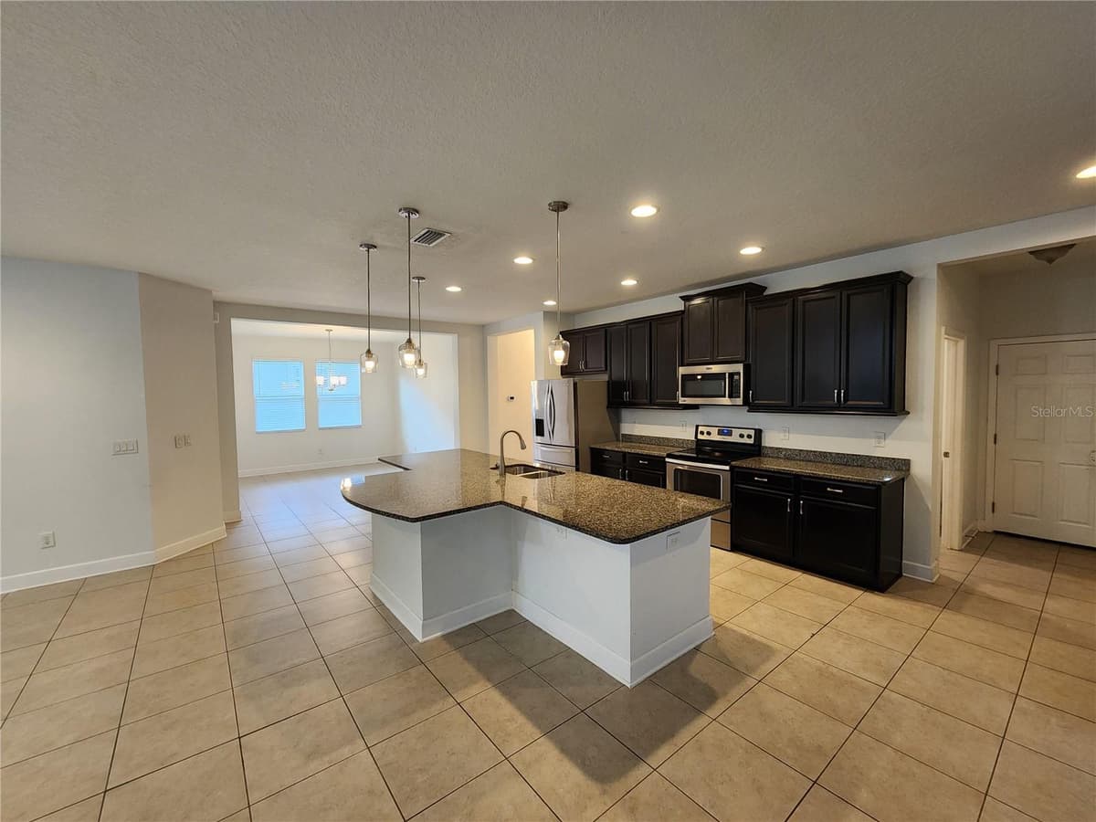 10457 WATERSTONE DRIVE — photo 6 of 76