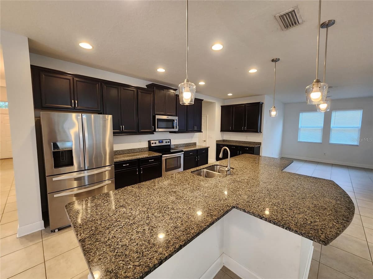 10457 WATERSTONE DRIVE — photo 4 of 76