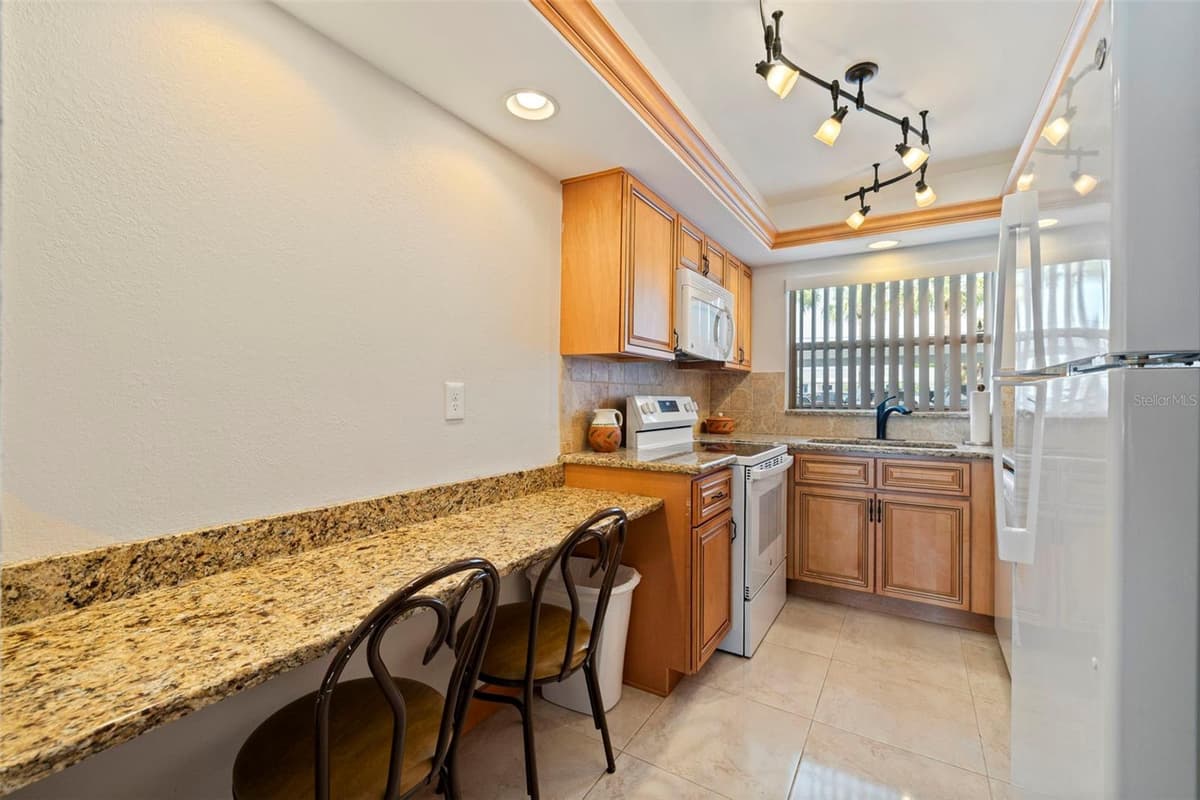 6363 GULF WINDS DRIVE — photo 13 of 26