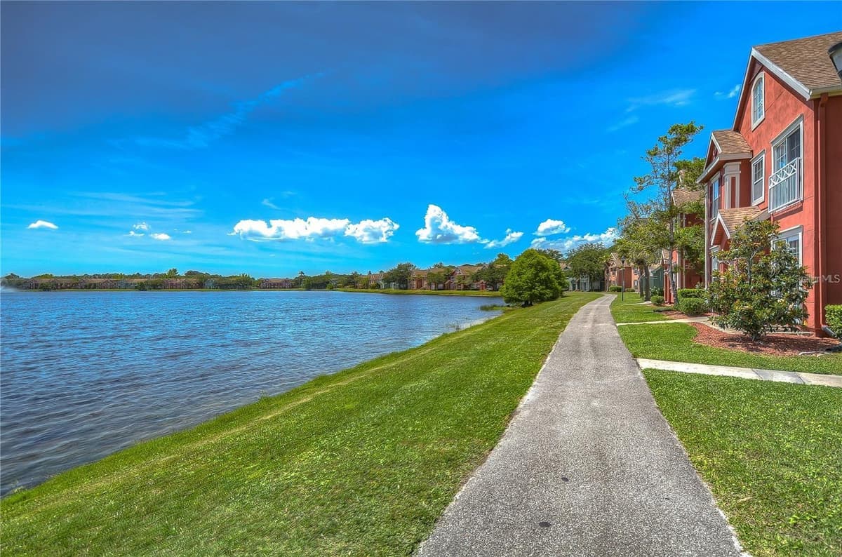 9034 LAKE CHASE ISLAND WAY — photo 4 of 39