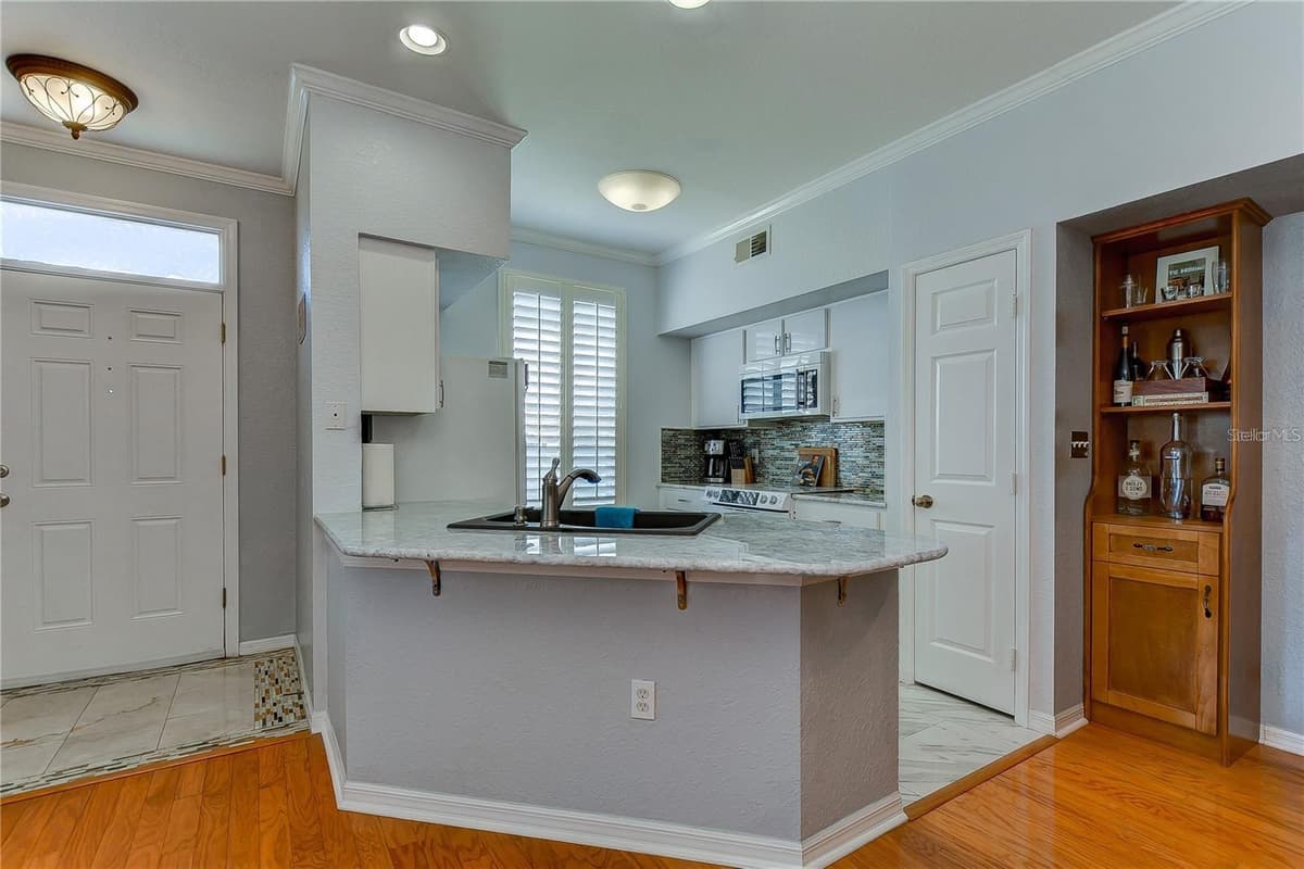 9034 LAKE CHASE ISLAND WAY — photo 18 of 39