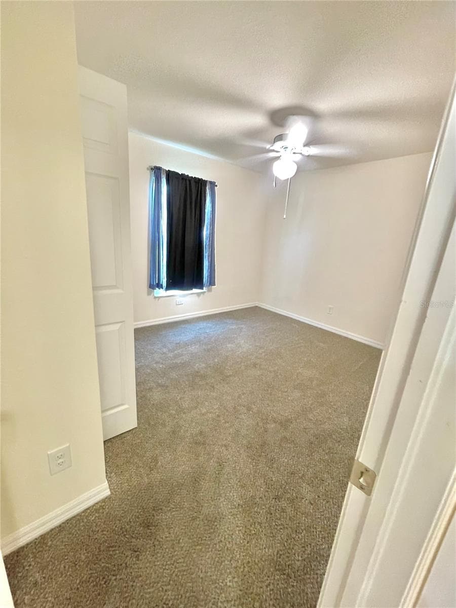 5029 HUMMINGBIRD DRIVE — photo 11 of 15