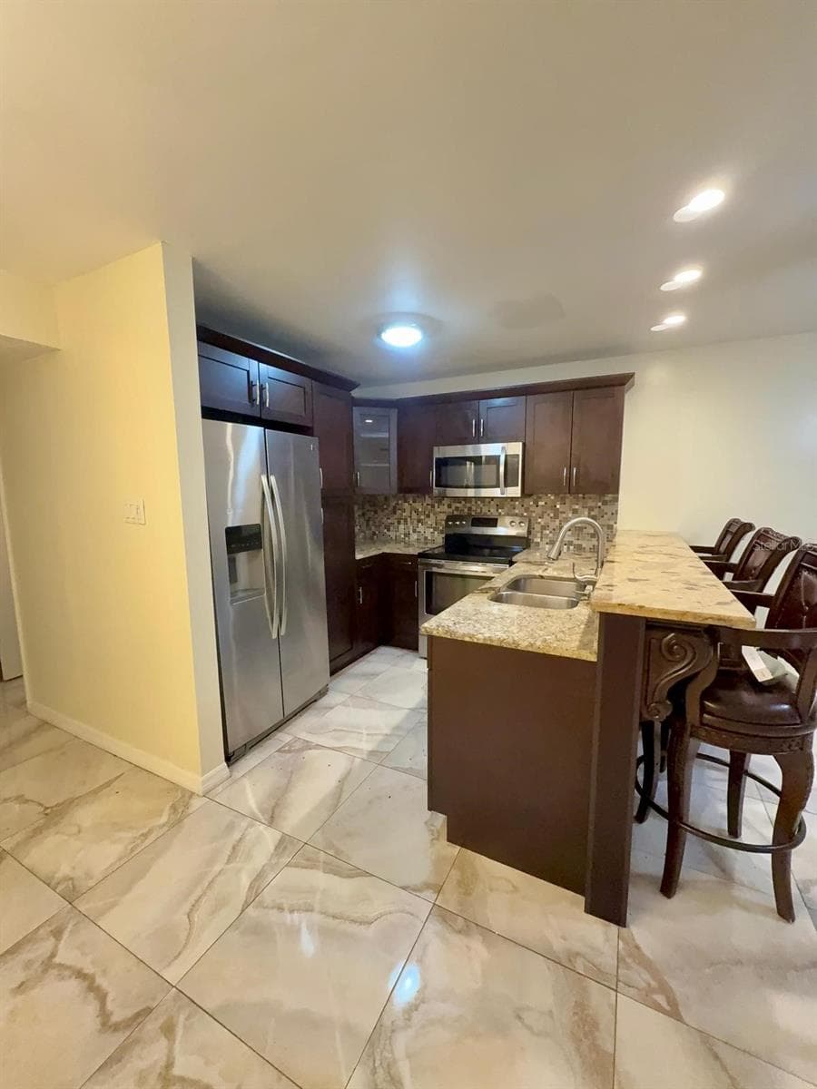 9109 HILLSBOROUGH AVENUE — photo 4 of 13
