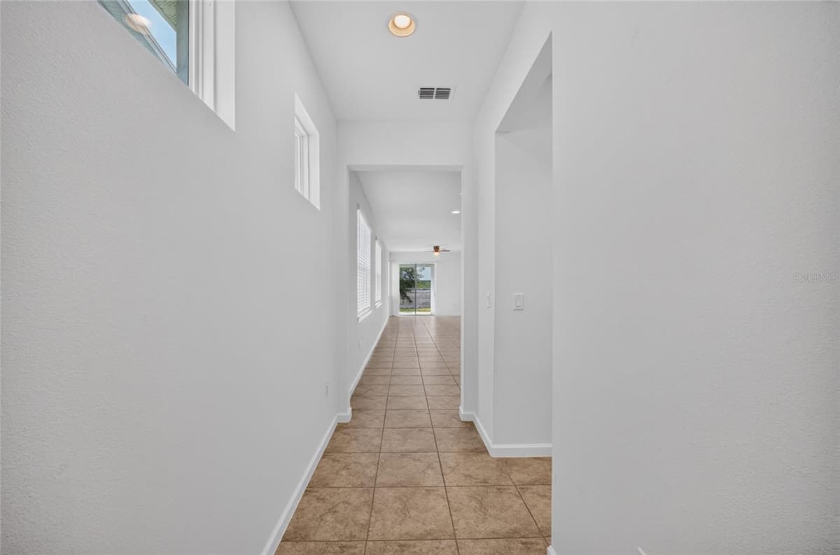 4406 DAVOS DR — photo 6 of 51