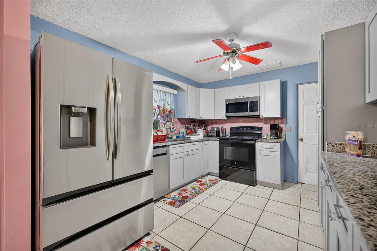 5907 UONA AVENUE — photo 11 of 34