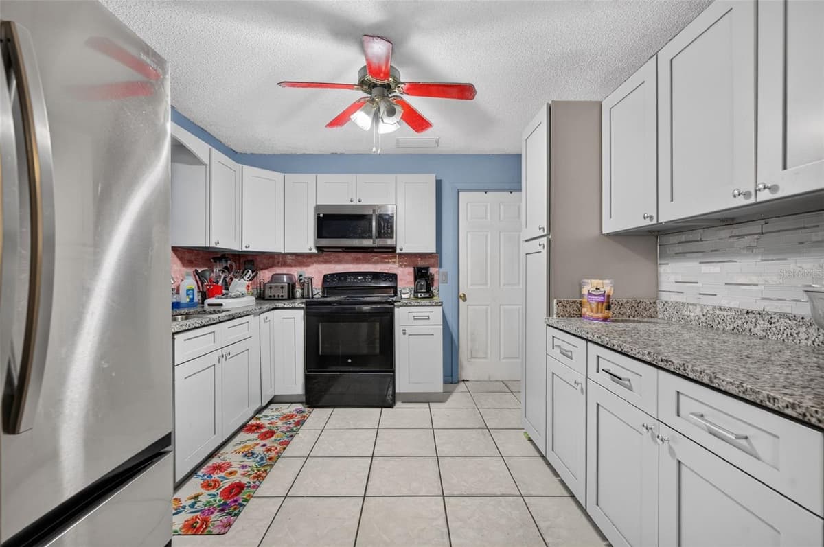 5907 UONA AVENUE — photo 12 of 34